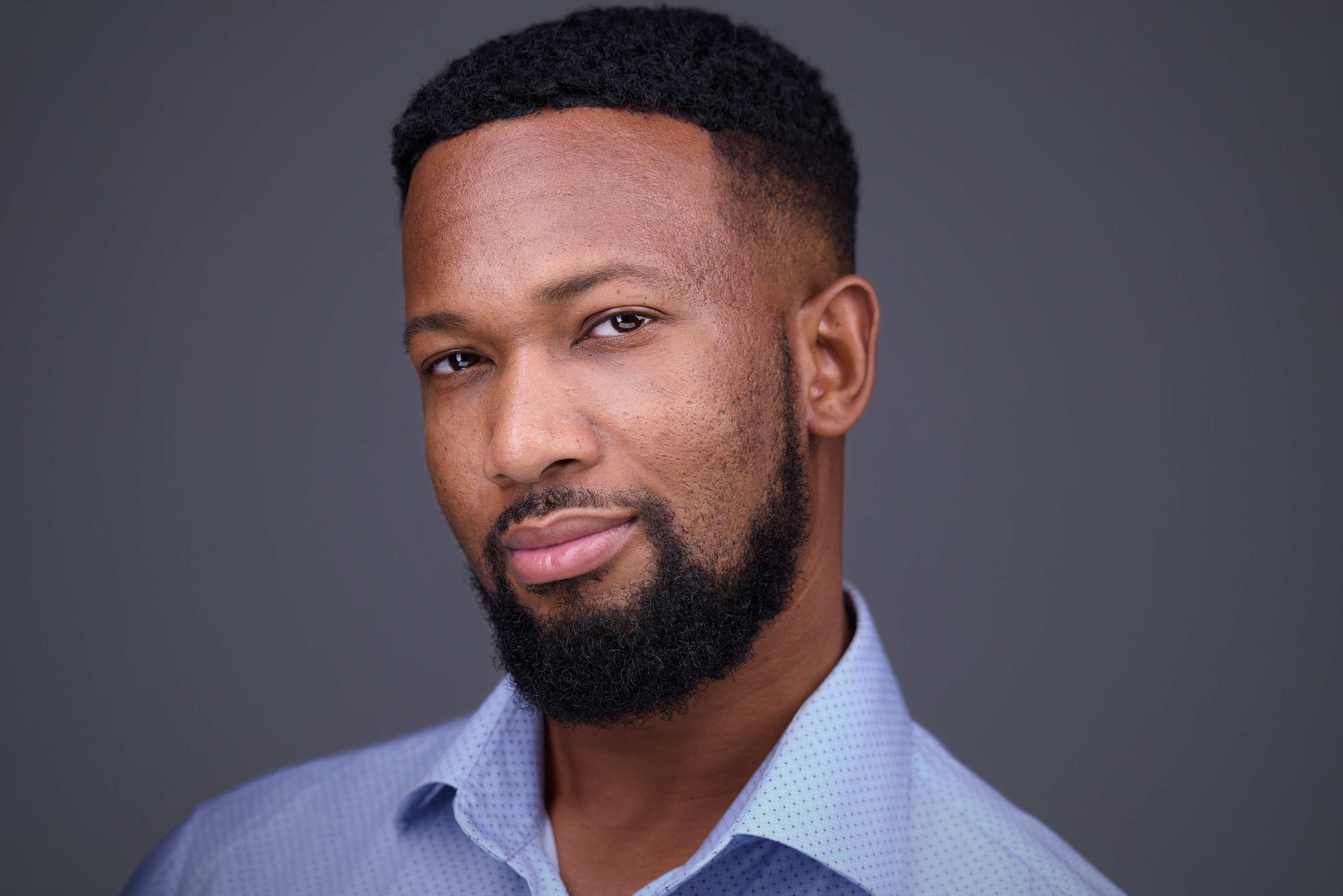 Professional headshot of Meka - leadership coach Bay Area